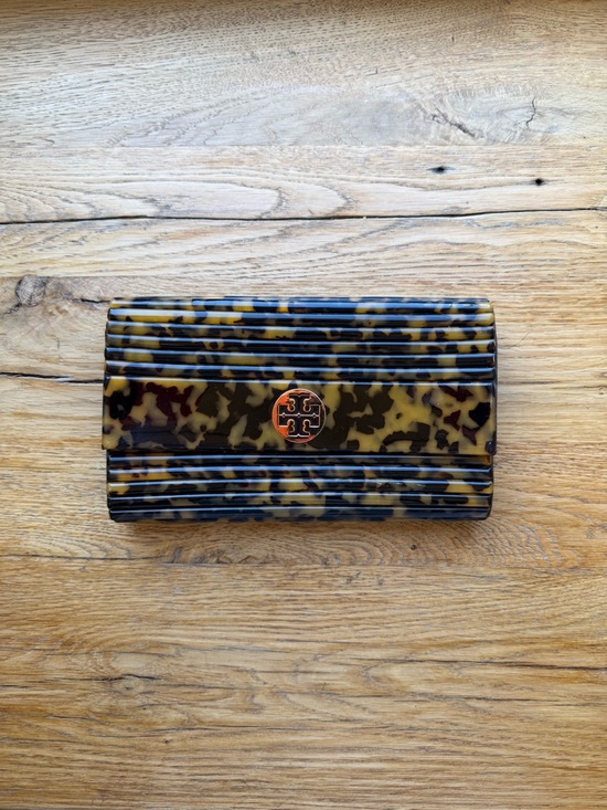 Tory Burch Handbags - Tory Burch Tortoiseshell Resin Fold-Over Clutch with Logo Medallion